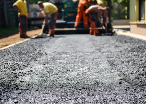 How Asphalt Installation Services Can Enhance the Durability of Your Driveway